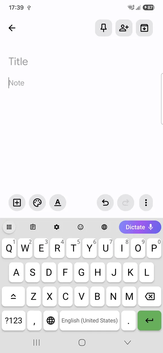 An empty note in Google Keep on an Android phone with the VoiceBoard keyboard open: an ordinary English QWERTY layout, and above the keys a row of icons ending in a Dictate button with a microphone.